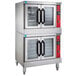 A Vulcan natural gas double deck convection oven with stainless steel racks and glass doors.