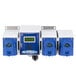 Three blue Dema V-Line OPL Laundry Chemical Dispenser pumps in a blue and white box.