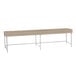 a long wooden bench with metal legs
