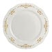 A Fineline Heritage plastic plate with a gold border and designs on the rim.