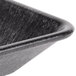 A black rectangular polyethylene condiment server with a handle.