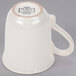 A brown stoneware mug with a white background.