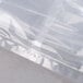 A close-up of a clear plastic bag with a seam.