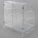 A clear acrylic Vollrath bakery display case with shelves.