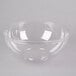 A clear plastic Fineline bowl with a lid.