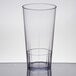 A clear Cambro plastic tumbler with a silver rim.