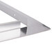 A stainless steel Vulcan Trim Kit corner bracket with a hole in it.