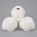 A 10 Strawberry Street Whittier white porcelain bowl caddy with three bowls stacked inside.