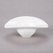 A white bowl with a curved edge.