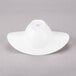 A close-up of a 10 Strawberry Street Somba white oval rim bowl.