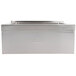 A silver rectangular stainless steel floor mounted mop sink with a drain.
