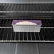 A loaf of bread in a Chicago Metallic aluminized steel bread loaf pan.