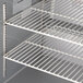 A close-up of a shelf inside a Beverage-Air worktop refrigerator.