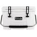A white Grizzly Cooler with black handles.