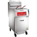 A large stainless steel Vulcan gas floor fryer with red handles.