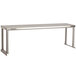 A stainless steel rectangular shelf above an Advance Tabco work table.