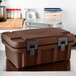 a brown plastic tool box