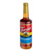 A Torani 750 mL glass bottle of gingerbread syrup with a yellow cap.