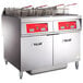 A Vulcan electric floor fryer system with 2 units.