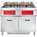 A Vulcan electric floor fryer system with a red rectangular KleenScreen filter.