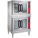 Two Vulcan double deck electric convection ovens with red handles.