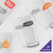 A group of clear GET Loft plastic pint glasses with a black logo.