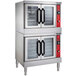 A large stainless steel Vulcan double deck gas convection oven with red handles on the doors.