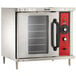 A Vulcan commercial electric convection oven with a red handle.