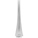 A close-up of a Libbey stainless steel serving spoon with a white background.