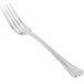 A close-up of a Libbey stainless steel dinner fork with a silver handle.