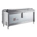 A stainless steel metal box with legs, a label, and a large oven inside.