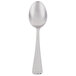 A Libbey stainless steel teaspoon with a white handle.