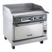 A stainless steel Vulcan VGM36C-NAT gas range with griddle and oven.