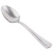 A Libbey stainless steel dessert spoon with a silver handle.