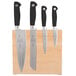 A Mercer Culinary Genesis 5-piece knife set on a rubberwood magnetic board.