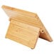 A Mercer Culinary bamboo magnetic knife rack on a wooden stand.