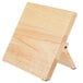 A Mercer Culinary rubberwood knife rack with a wooden board on a wooden stand.