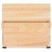 A Mercer Culinary rubberwood magnetic knife rack.