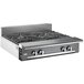 A Vulcan stainless steel liquid propane range with four burners on a counter.