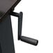 A black metal Luxor stand up desk with a black oak desktop.