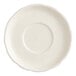 An Acopa ivory stoneware saucer with a scalloped edge.