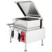 A Vulcan stainless steel 40 gallon manual tilt braising pan with a lid tilted open.