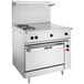 A large stainless steel Vulcan commercial electric range with 2 French plates and 2 hot tops.