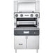 A large stainless steel Vulcan upright broiler with two ovens.