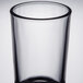 A close up of a clear Libbey Puebla tumbler with a black rim.