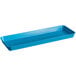 A blue rectangular Cambro market pan on a counter.