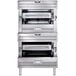 A large silver Vulcan natural gas double upright broiler with two doors.