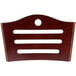 A Lancaster Table & Seating mahogany finish wooden bistro back rest with holes in it.