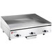 A Wolf stainless steel countertop electric griddle with thermostatic controls.