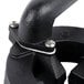 A black metal pipe with screws.